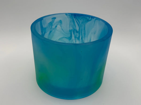 Blue and green container on a white background