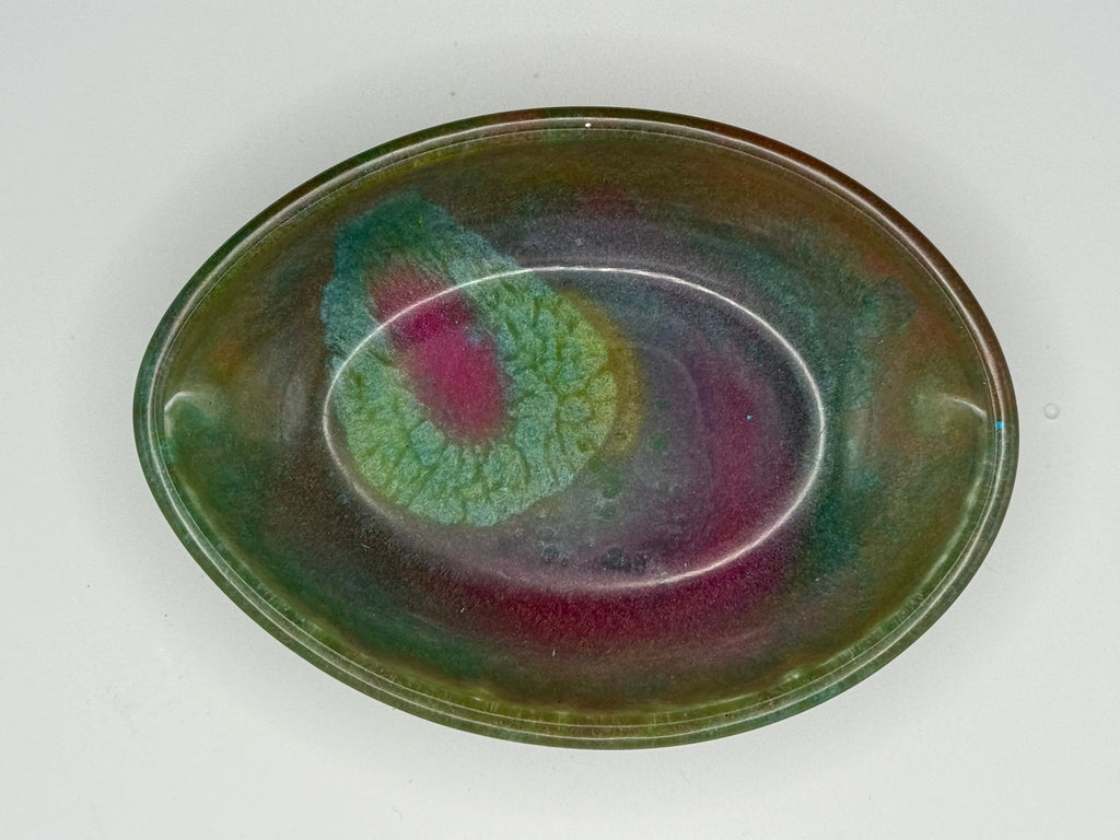 Decorative resin dish with multicolors on a white background. Perfect for a soap dish or trinket tray. 