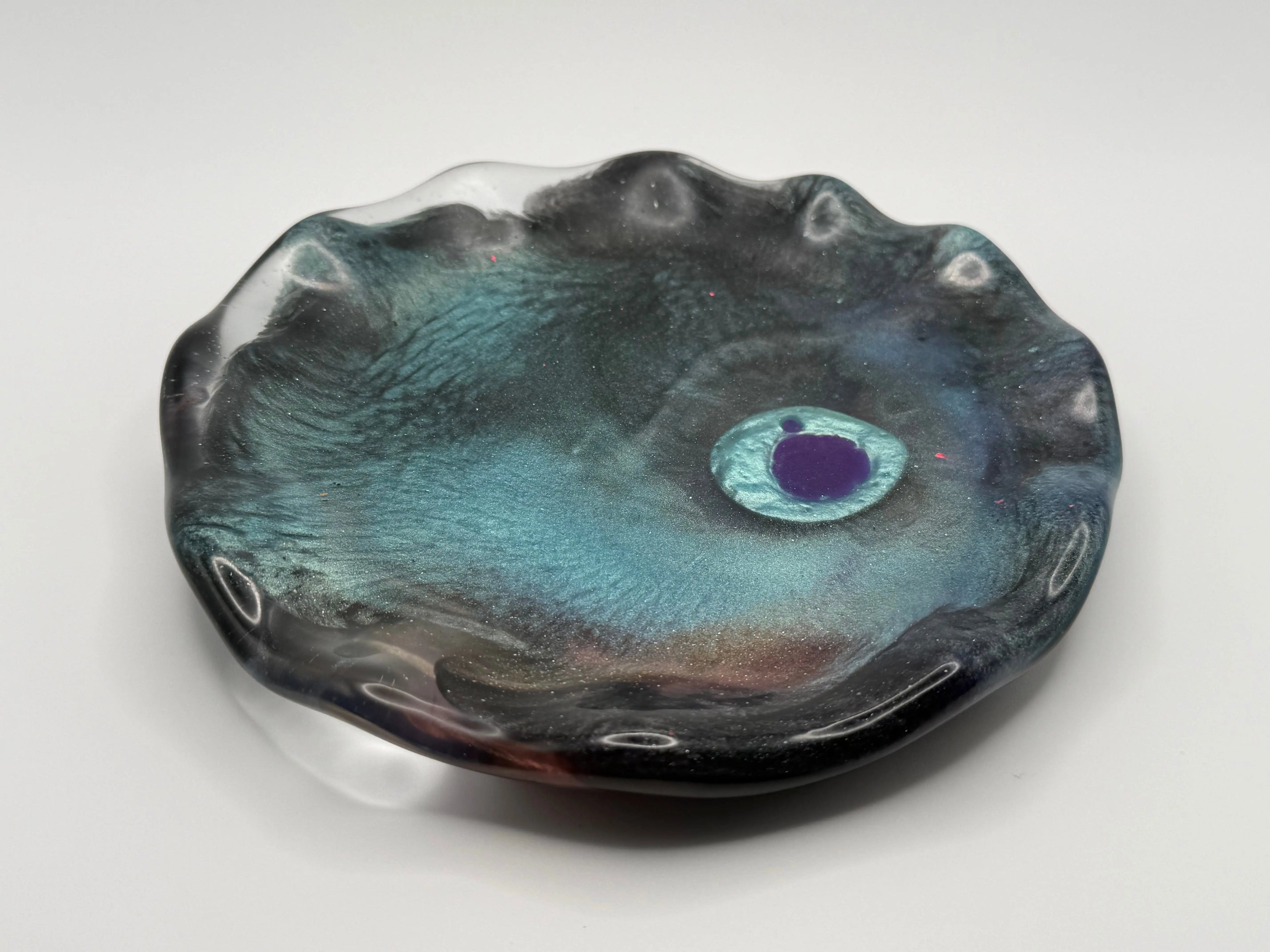 Teal, purple and black abstract design plate